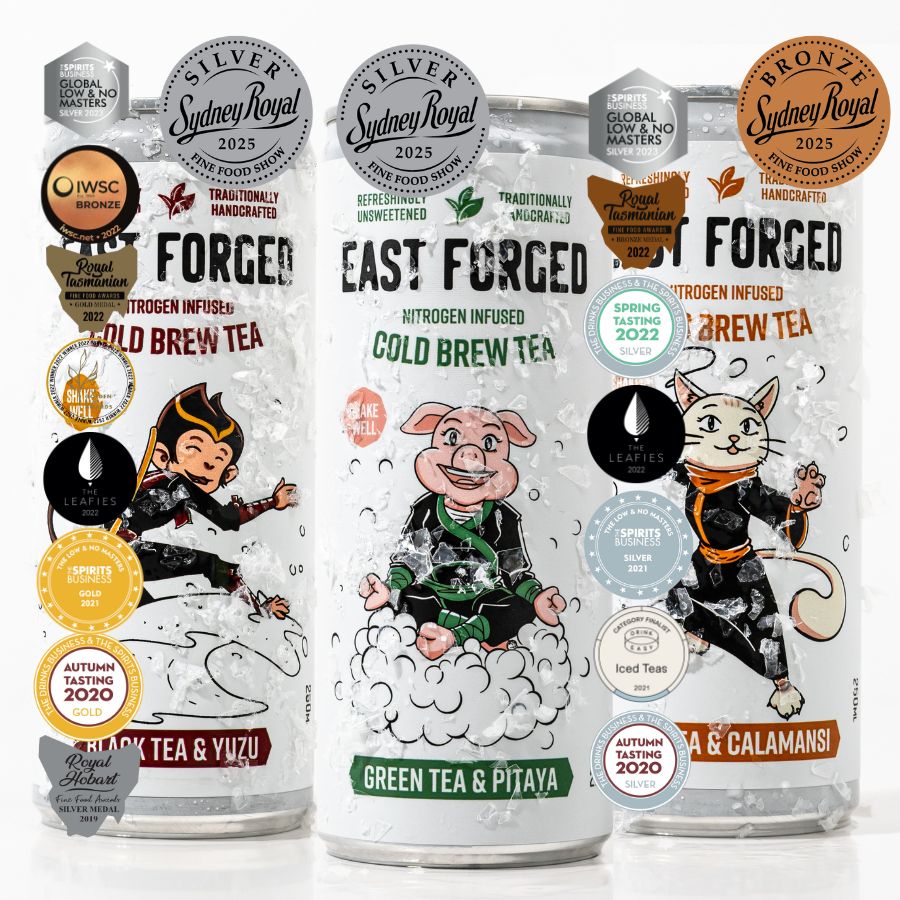 Three packages of 'Forged' cold brew tea with cartoon characters and various awards on a white background.